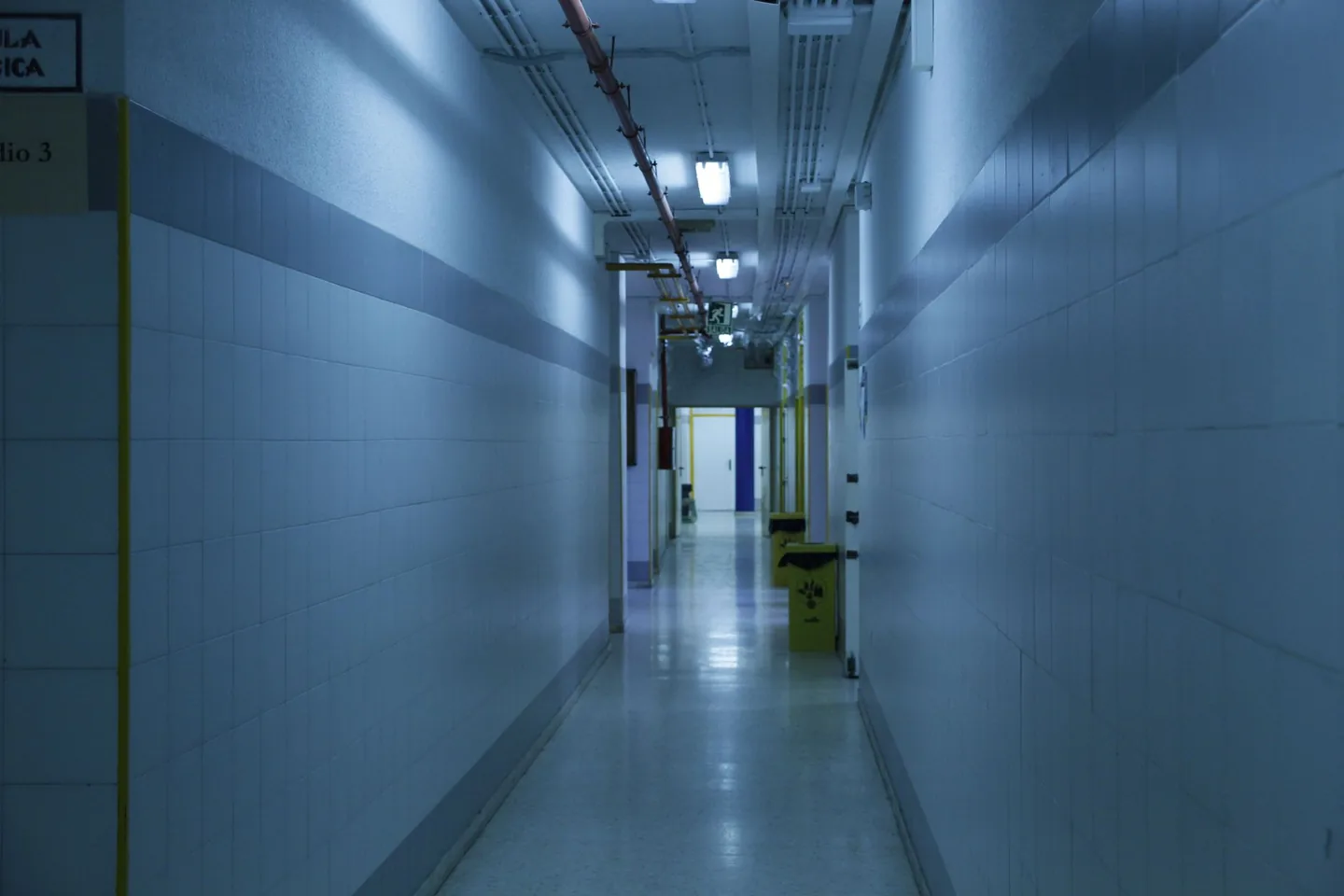 Bright, empty hospital corridor